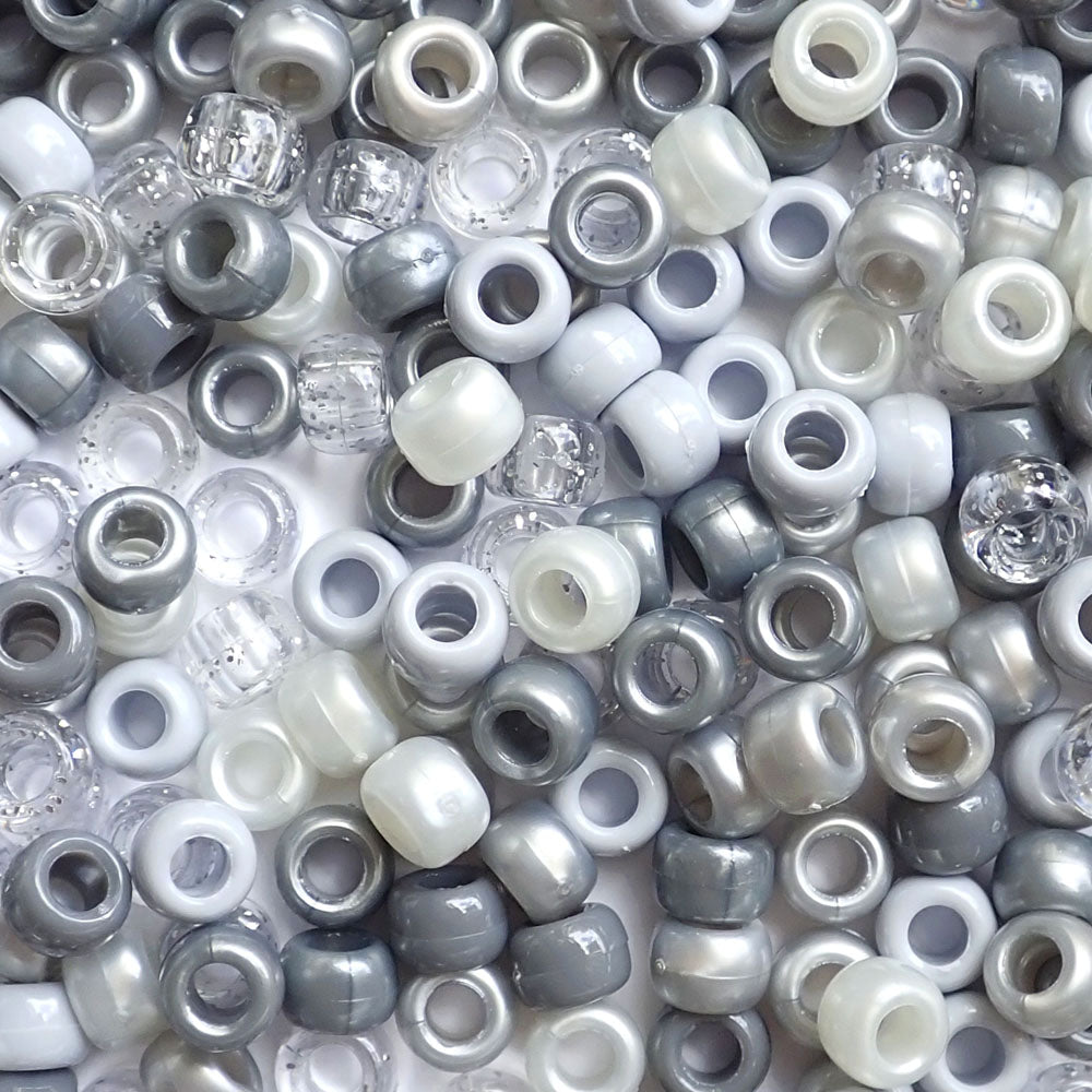 Different shades of gray of Plastic Pony Beads. Size 6 x 9 mm. Craft Beads for making bracelets, jewelry making, arts & crafts.