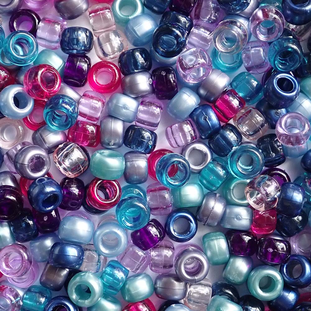 Blue, pink and purple shades of Plastic Pony Beads. Size 6 x 9 mm. Craft Beads for making bracelets, jewelry making, arts & crafts.