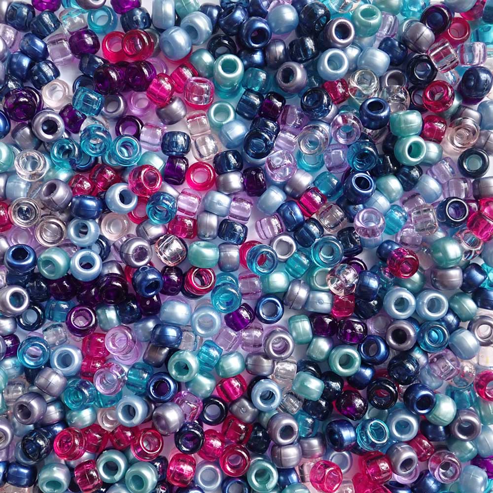 Blue, pink and purple shades of Plastic Pony Beads. Size 6 x 9 mm. Craft Beads for making bracelets, jewelry making, arts & crafts.