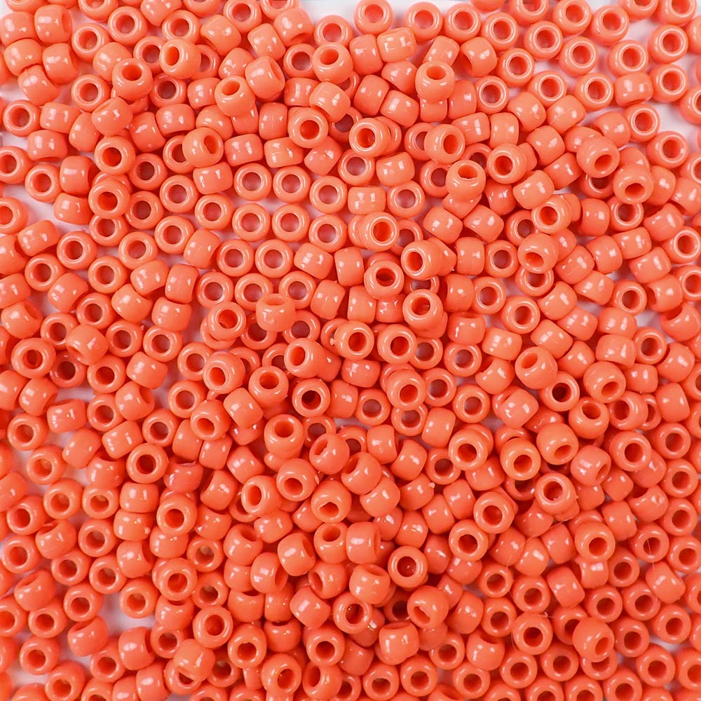 Coral Plastic Pony Beads. Size 6 x 9 mm. Craft Beads. Made in the USA.