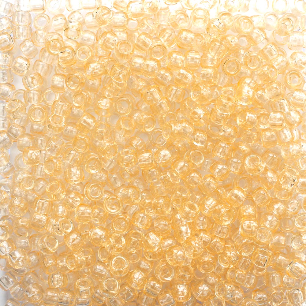 Light Apricot Transparent Plastic Pony Beads. Size 6 x 9 mm. Craft Beads. Made in the USA.