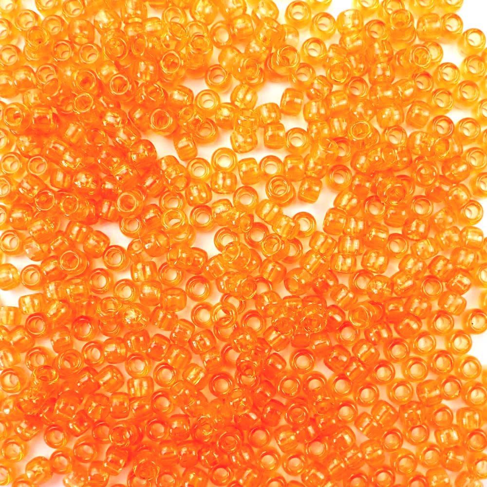 6 x 9mm plastic pony beads in transparent orange