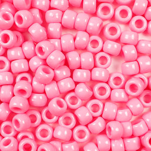 Pink opaque 6 x 9mm plastic pony beads