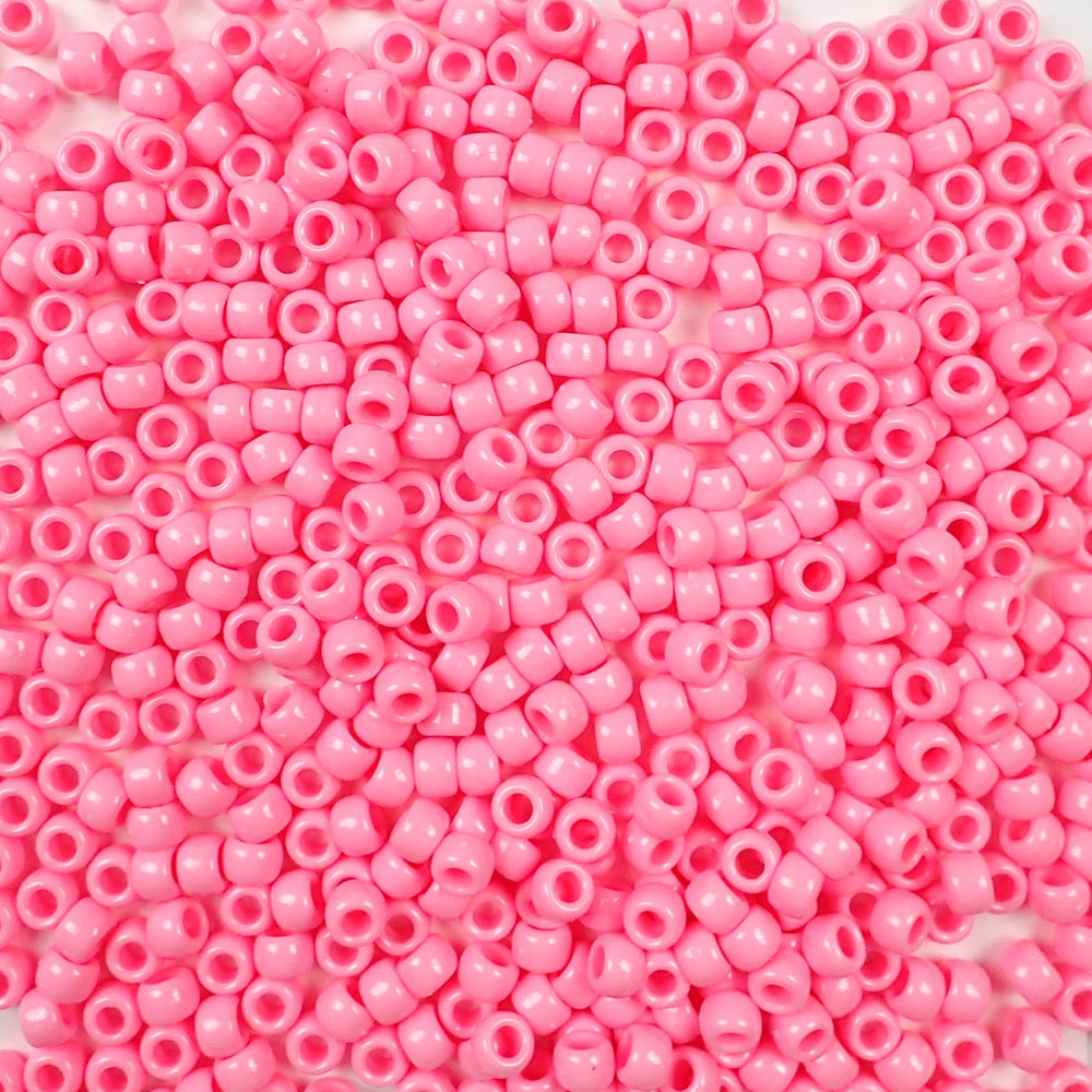 Pink opaque 6 x 9mm plastic pony beads