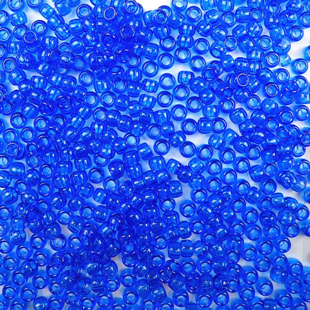 Dark Sapphire Blue Transparent Plastic Pony Beads. Size 6 x 9 mm. Craft Beads. Made in the USA.