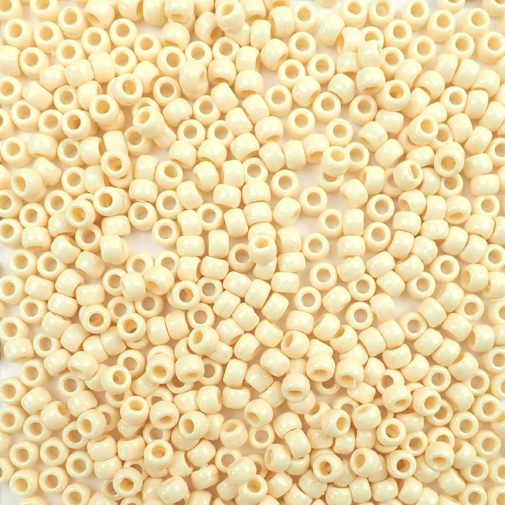 Ivory Plastic Pony Beads. Size 6 x 9 mm. Craft Beads. Made in the USA.