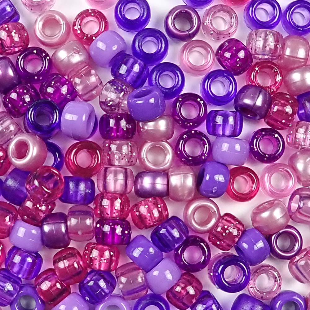 a mix of violet and purple colors of 6 x 9mm plastic pony beads