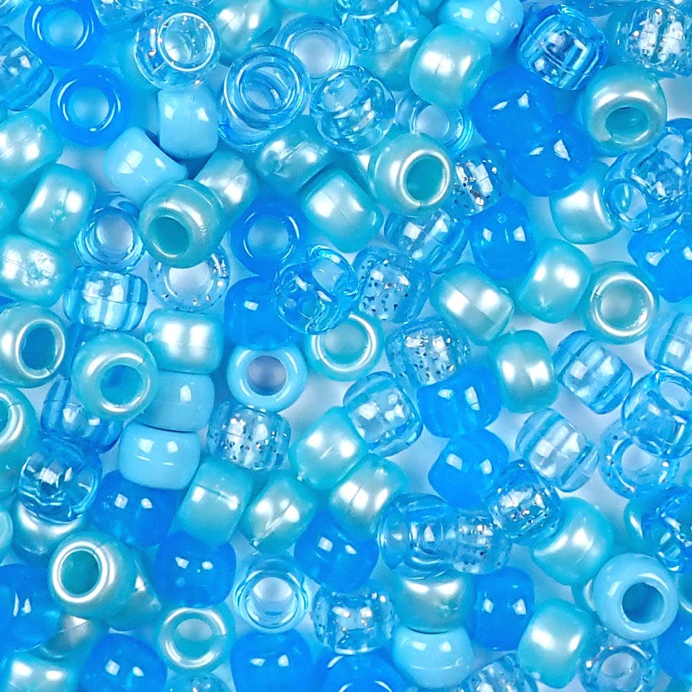 a mix of light blue colors of 6 x 9mm plastic pony beads
