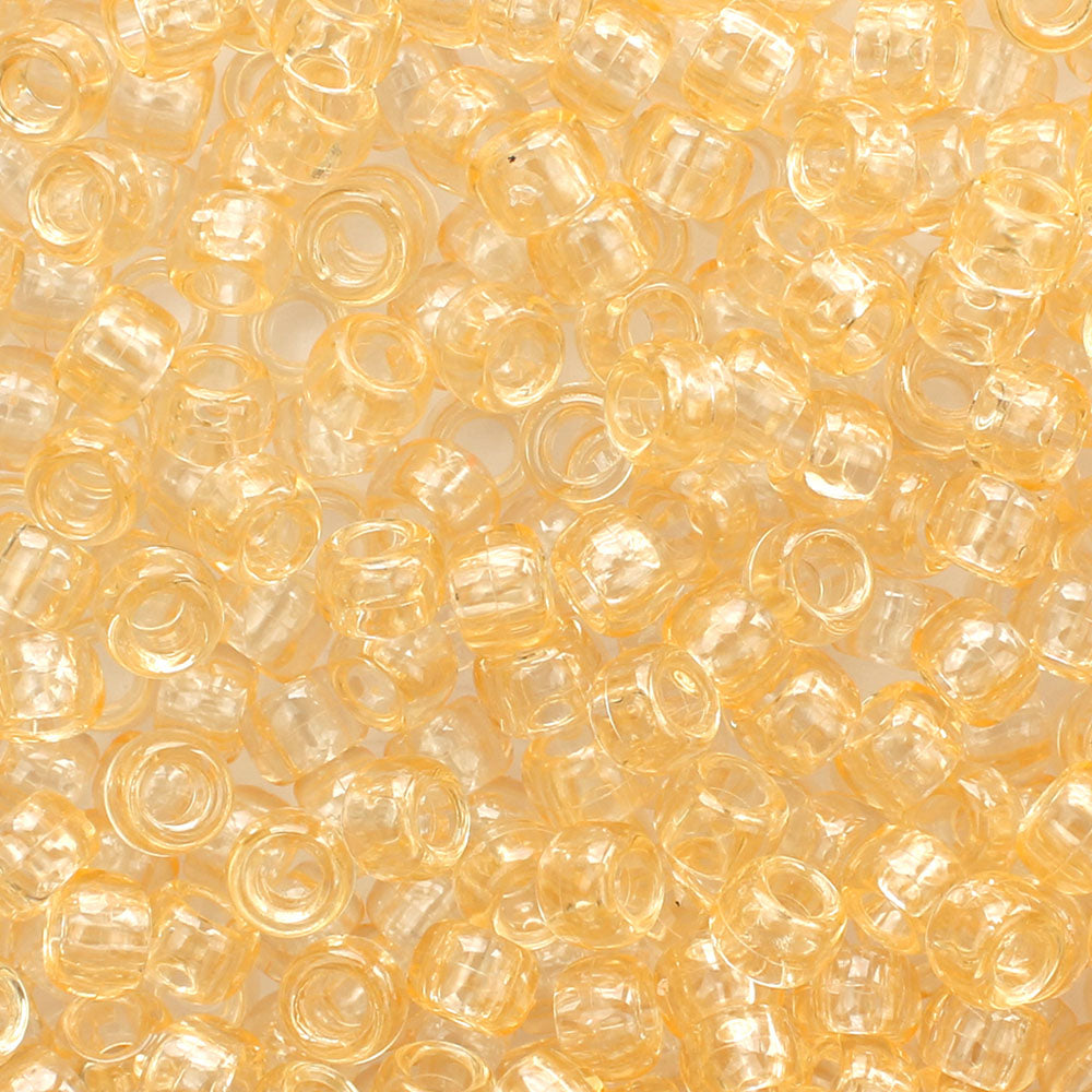 Light Apricot Transparent Plastic Pony Beads. Size 6 x 9 mm. Craft Beads. Made in the USA.